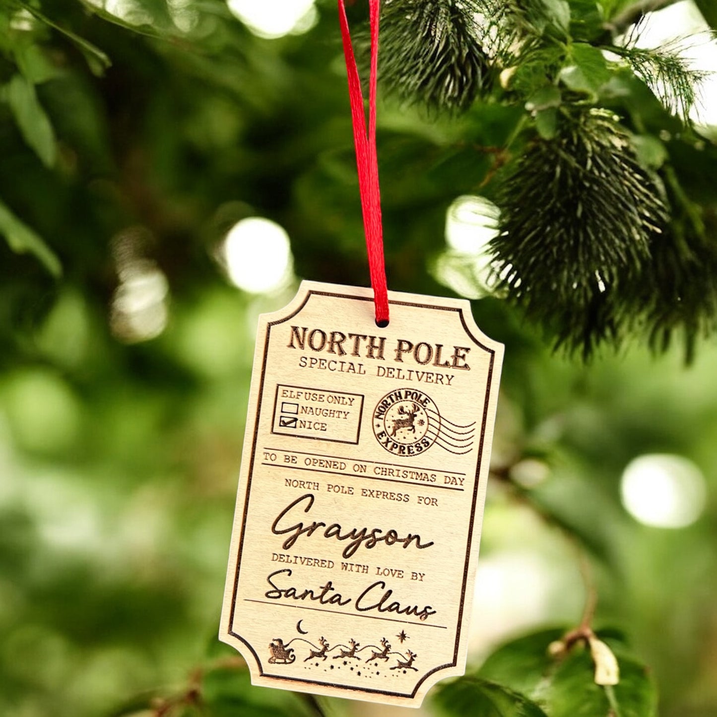 North Pole themed wooden keepsake ornament for Christmas tree