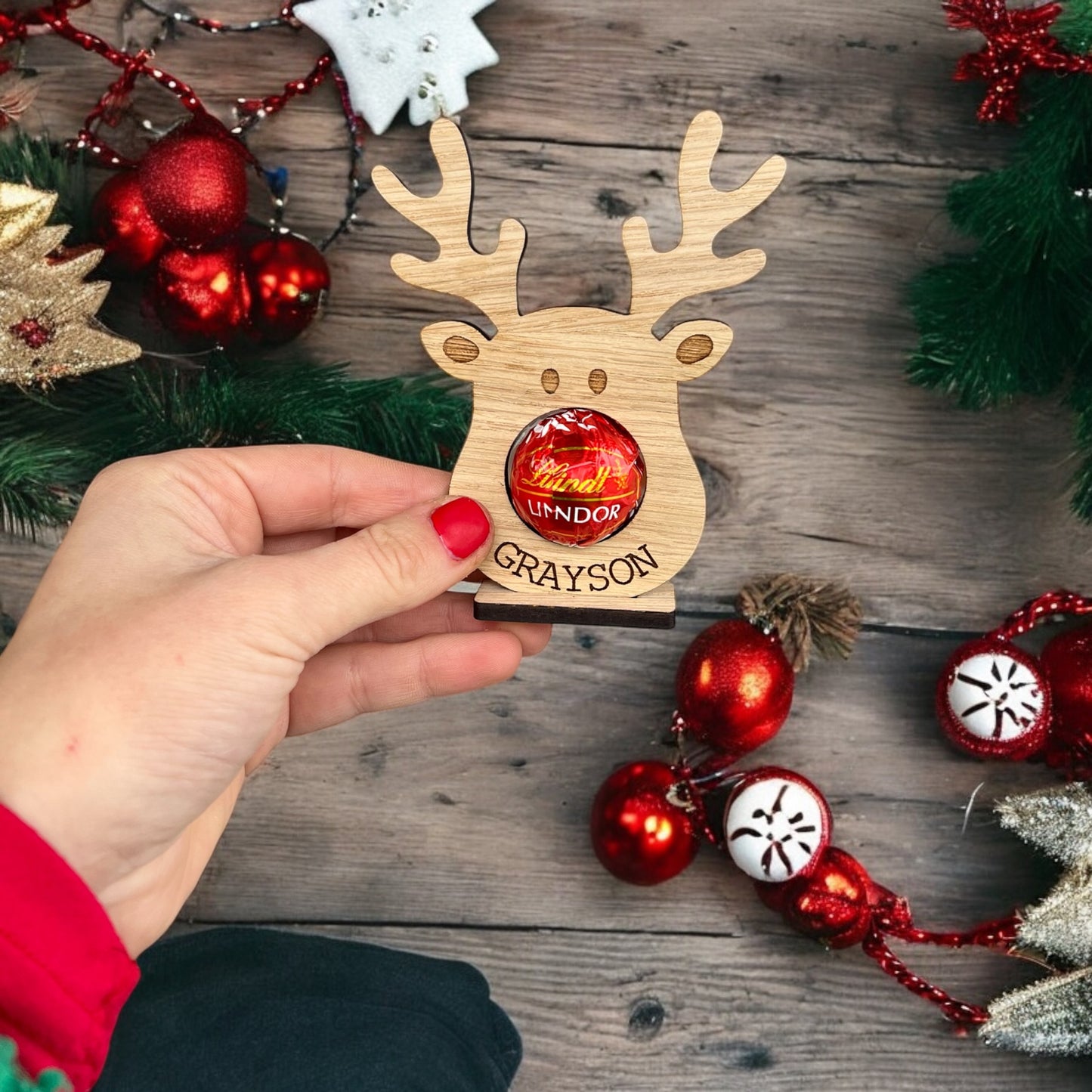 Festive reindeer name place decoration for holiday celebrations