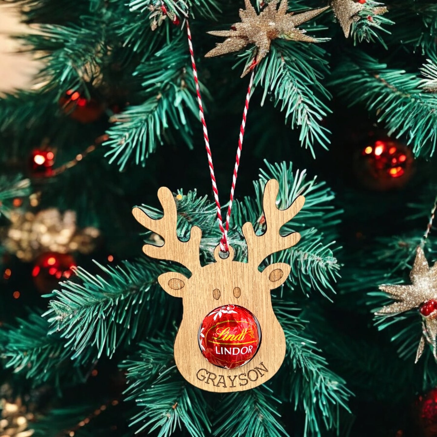 Personalised wooden reindeer chocolate holder with engraved name