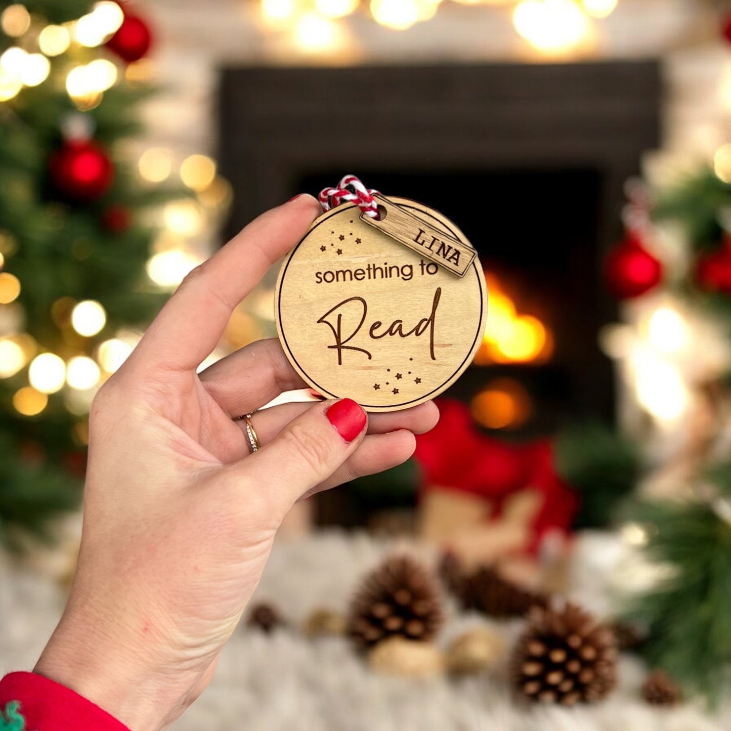 Holiday gift tag with red & white string, engraved with name