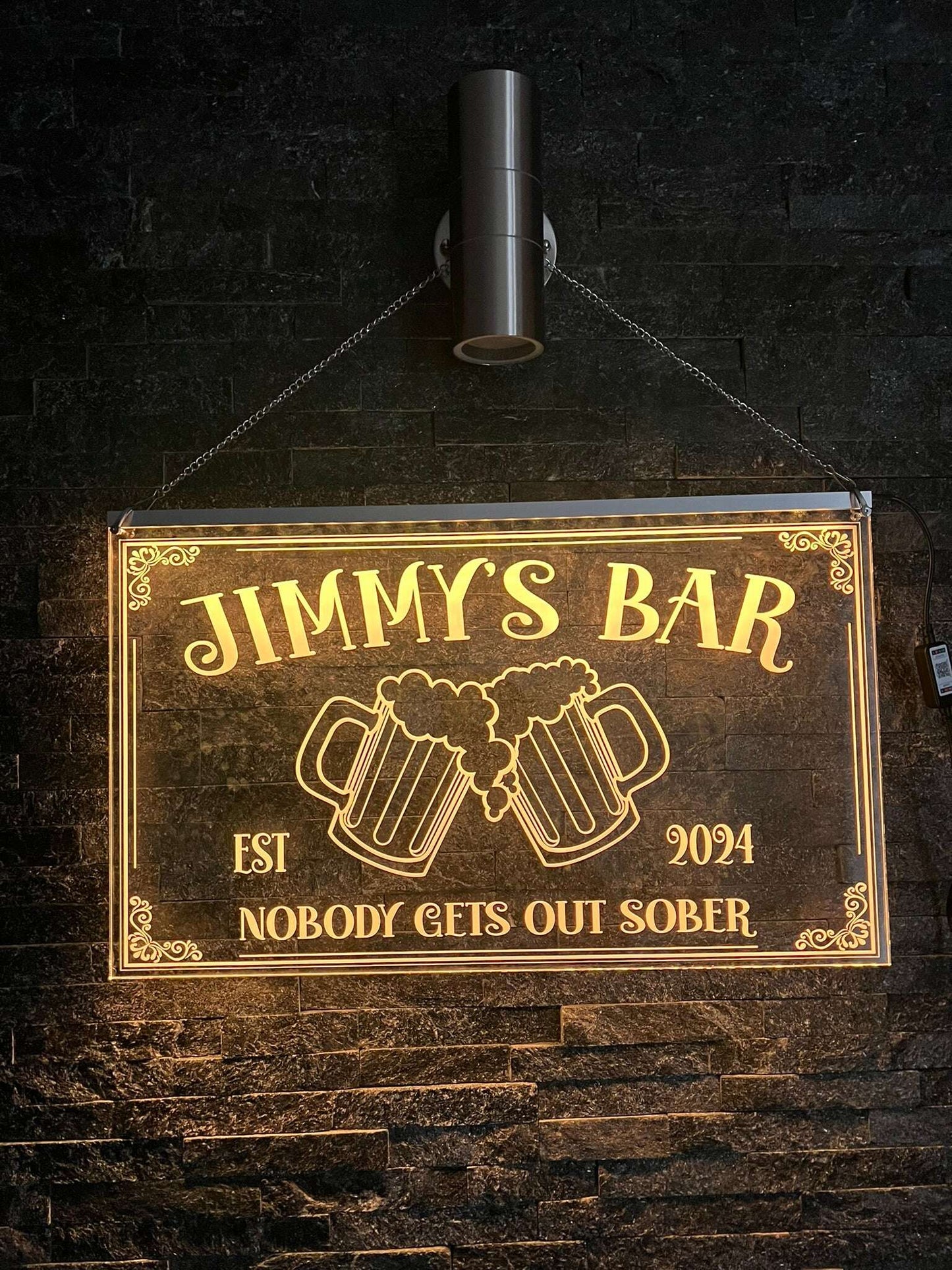 Colour-changing LED sign for modern home bar