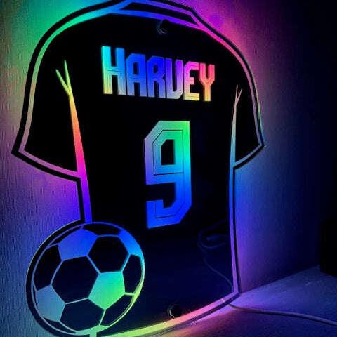 Glowing football shirt LED sign for sports lovers.