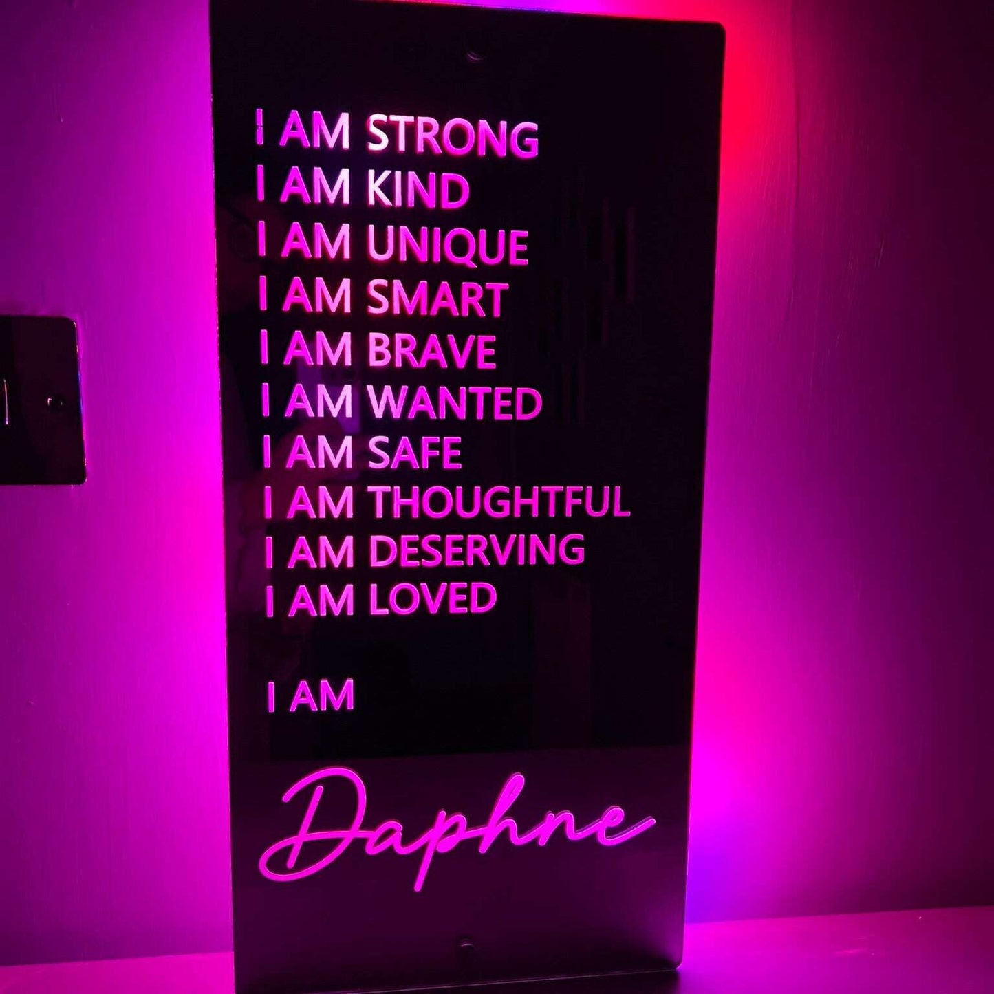Custom LED mirror sign for an inspiring bedroom atmosphere