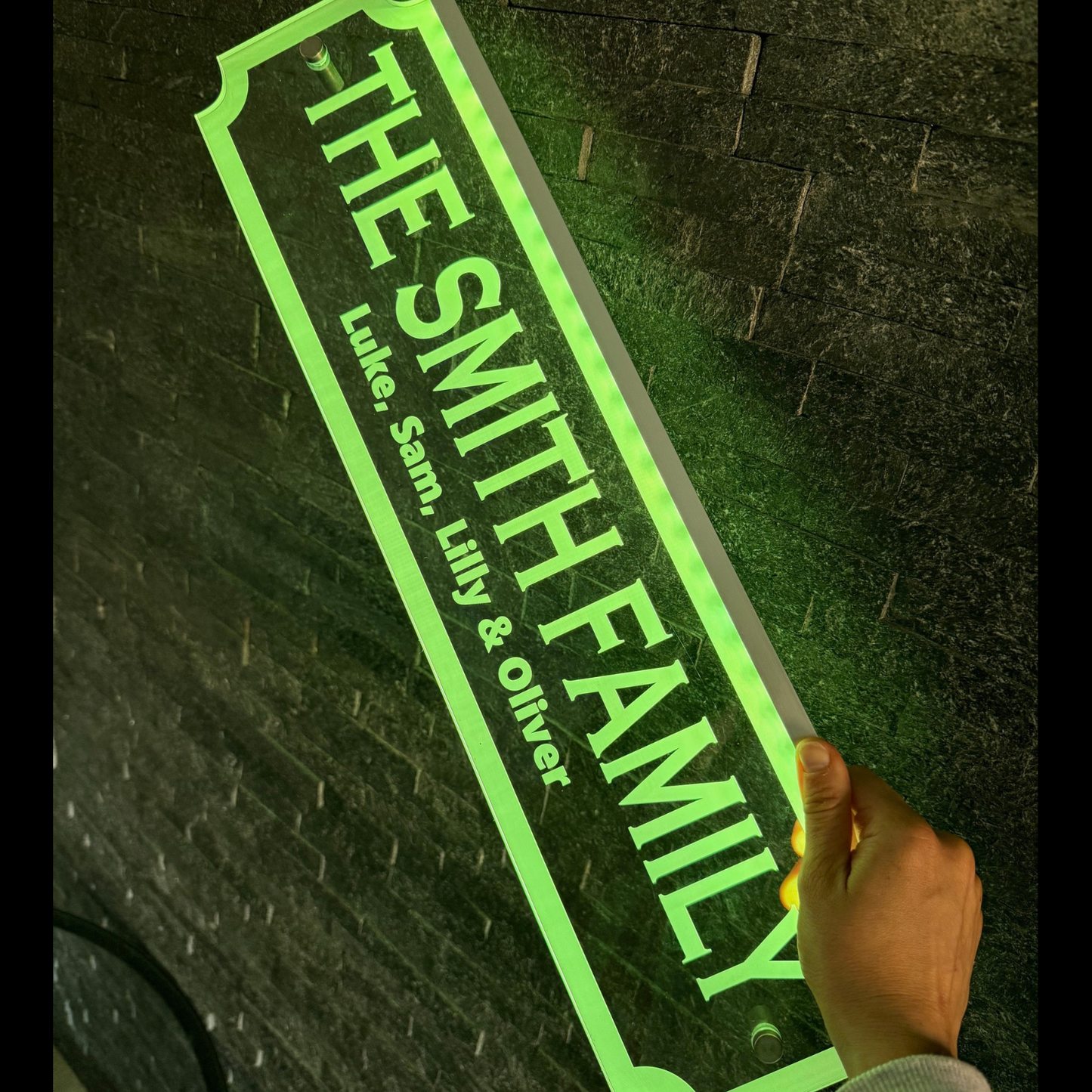 Custom name LED sign showing multi-colour lighting modes
