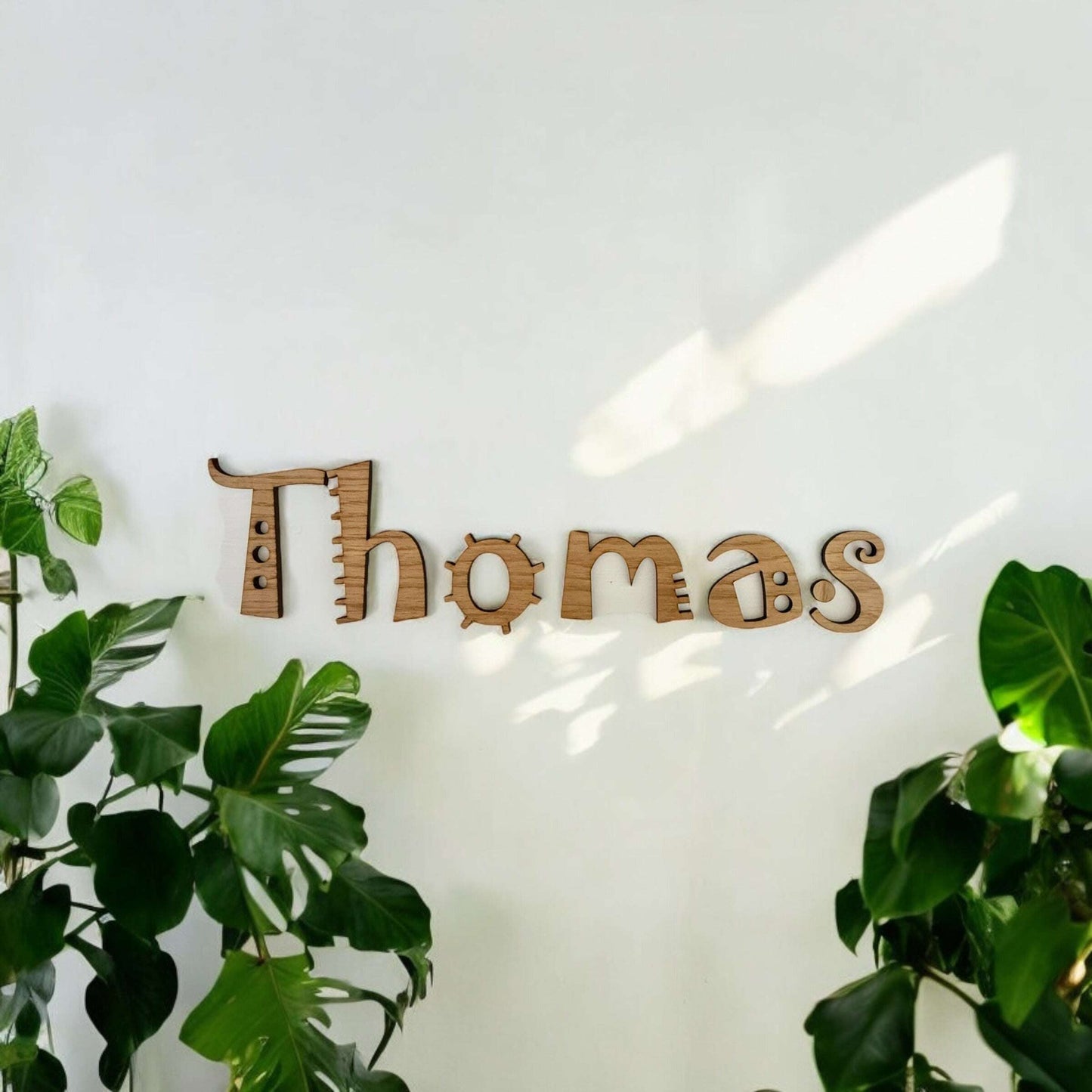 Wooden name sign with script font – ideal for kids' room