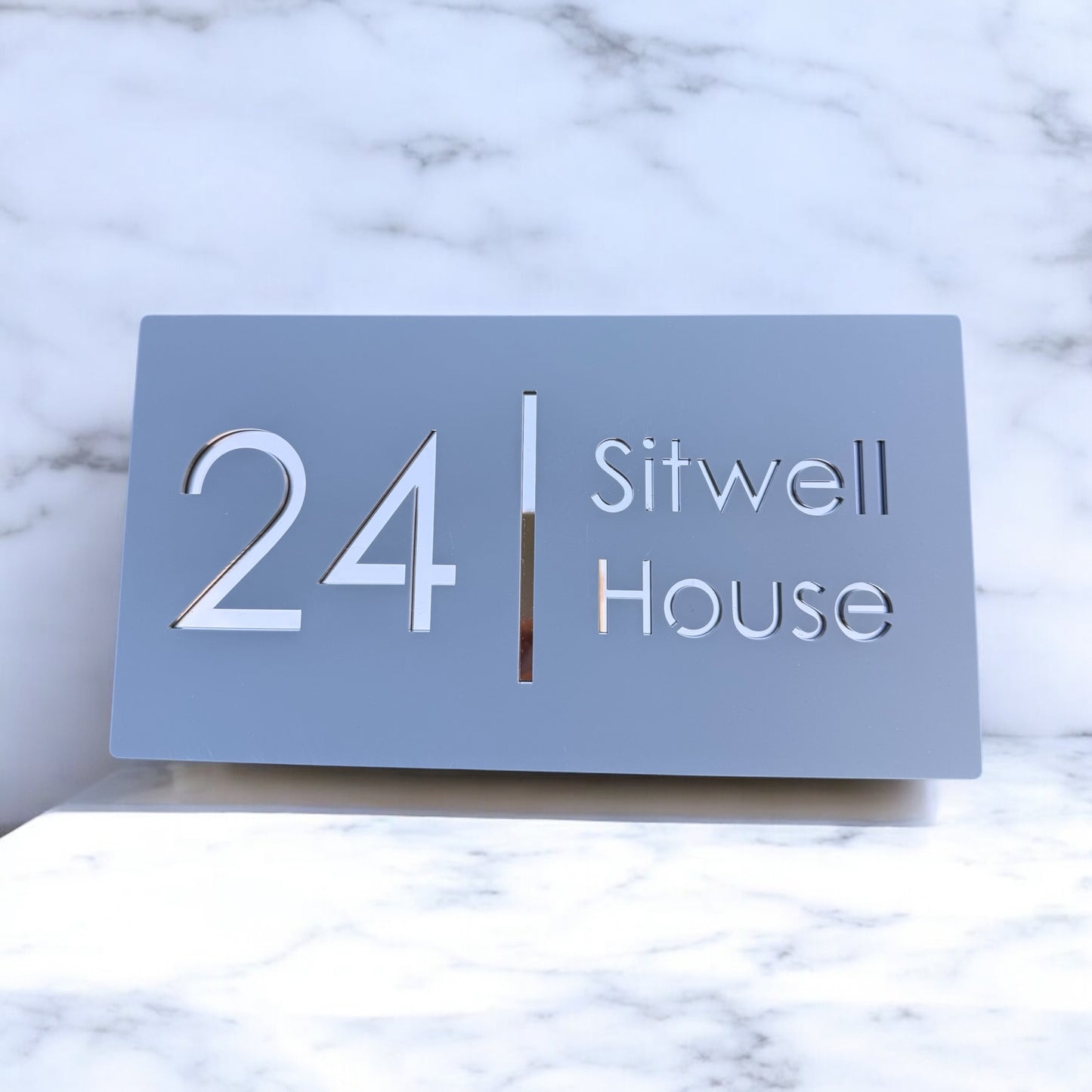 Elegant floating address plaque with bold street name and number