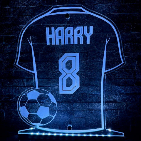 LED football shirt sign mounted on a bedroom wall as decor.