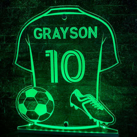 App-controlled personalised football LED sign glowing on wall