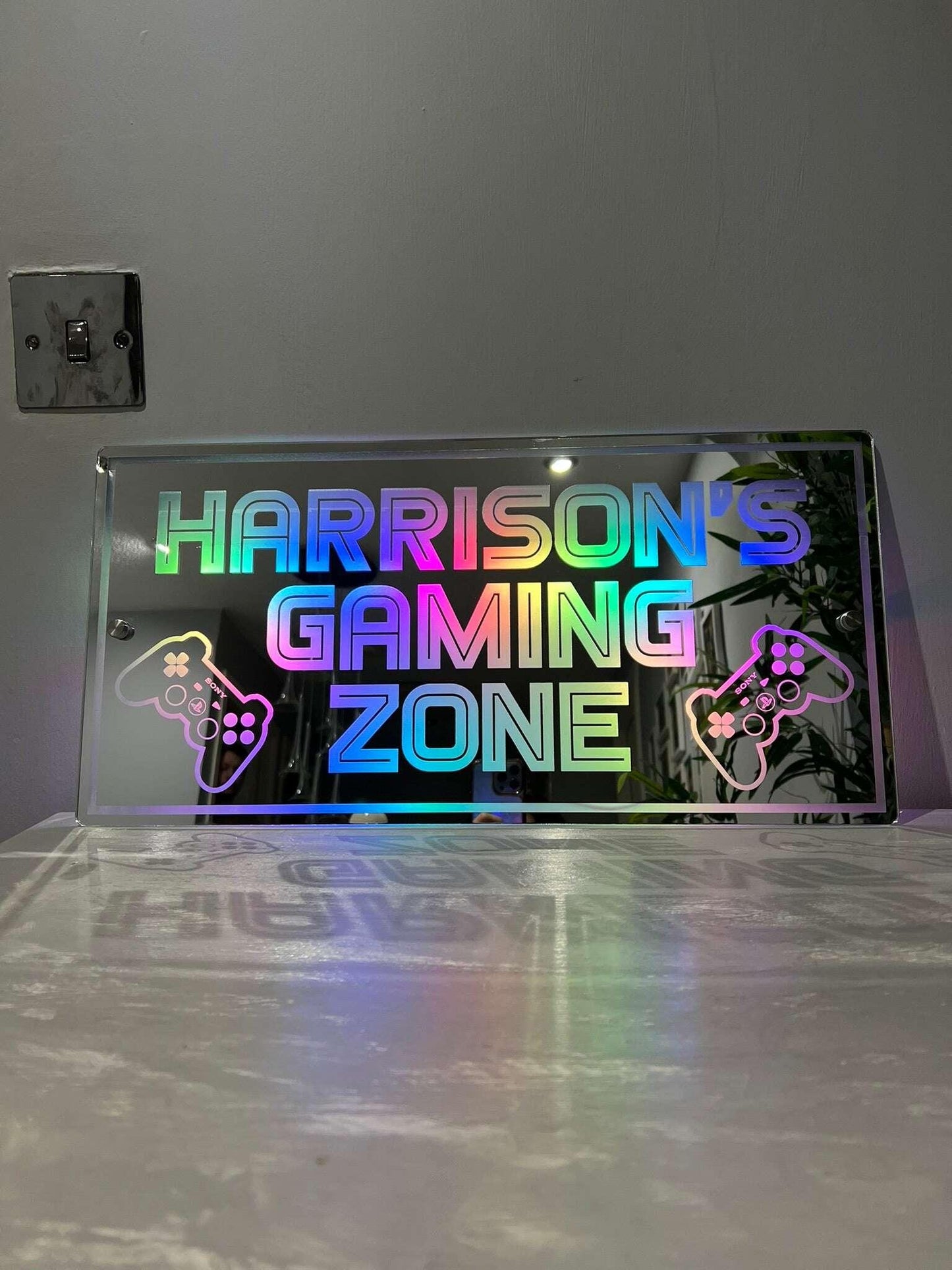Acrylic LED gaming sign featuring a PlayStation-style controller