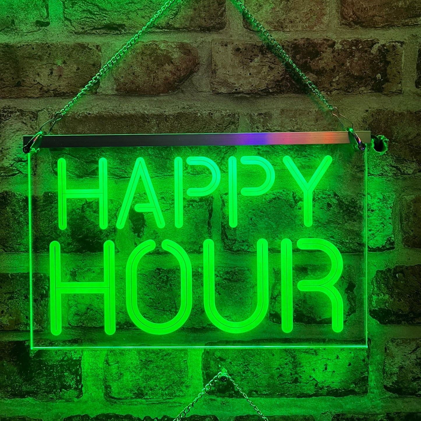 LED sign with remote control showing colour and brightness settings.