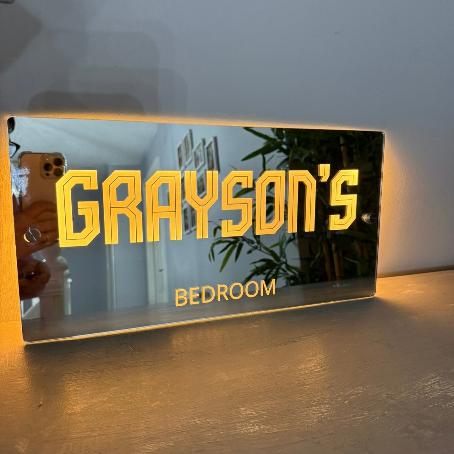 Custom LED mirror sign showcasing 366 different light effects and colour-changing modes