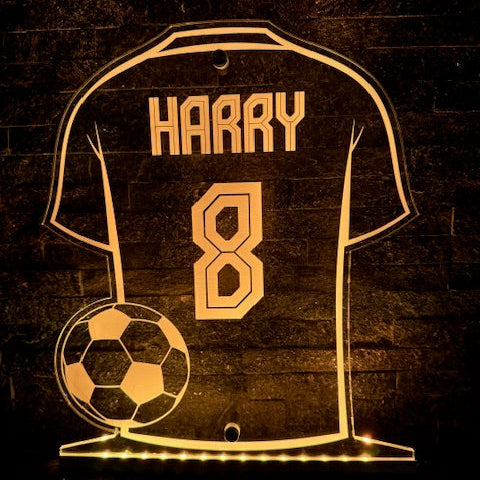 Personalised LED football shirt sign illuminated in vibrant colours.