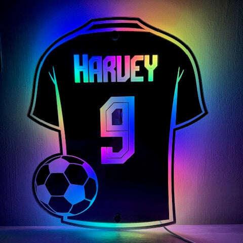 Personalised LED mirror football shirt with custom name.