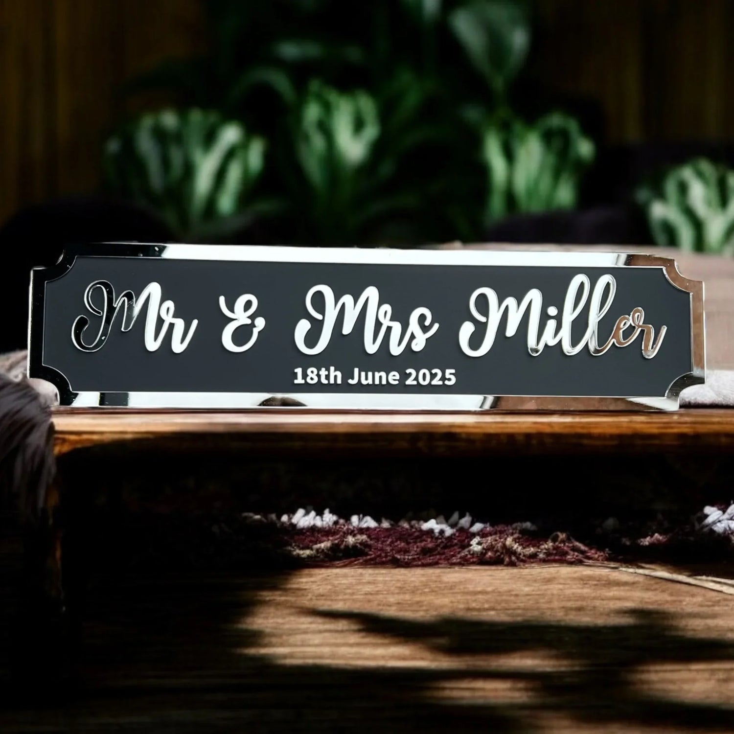 Elegant personalised wedding sign displayed at a beautifully decorated wedding venue
