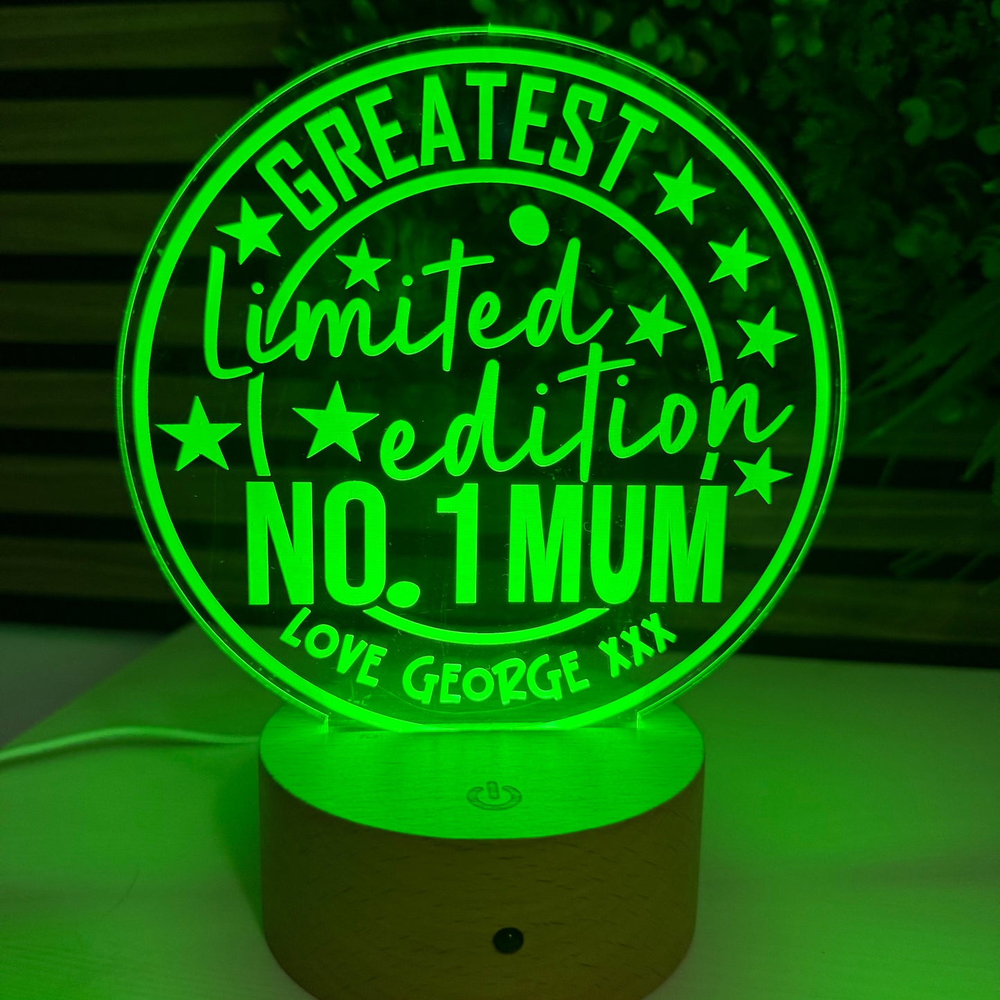 Green night light with 'Greatest Limited Edition No. 1 Mum' text on a white wall.