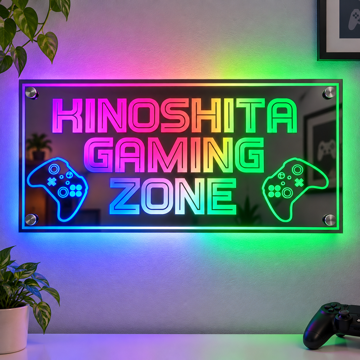 Kinoshita Gaming Zone LED sign lit in rainbow colours with game controller icons