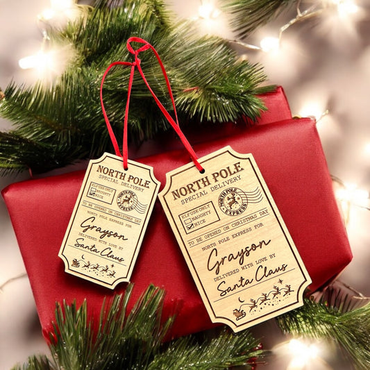 Personalised wooden Santa gift tag with red ribbon – North Pole special delivery design