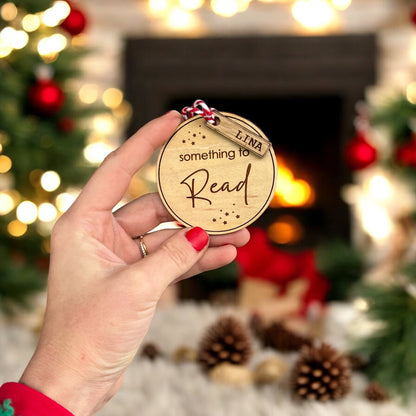 Holiday gift tag with red & white string, engraved with name