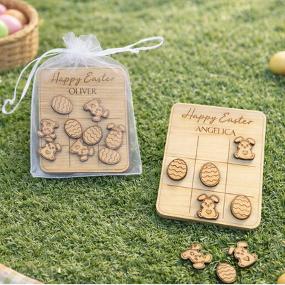 Wooden Easter name tags with personalized names on a grassy background
