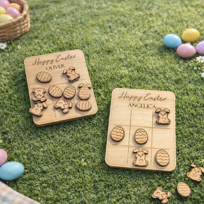 Two wooden Easter puzzles with personalized names on a grassy background with Easter eggs.