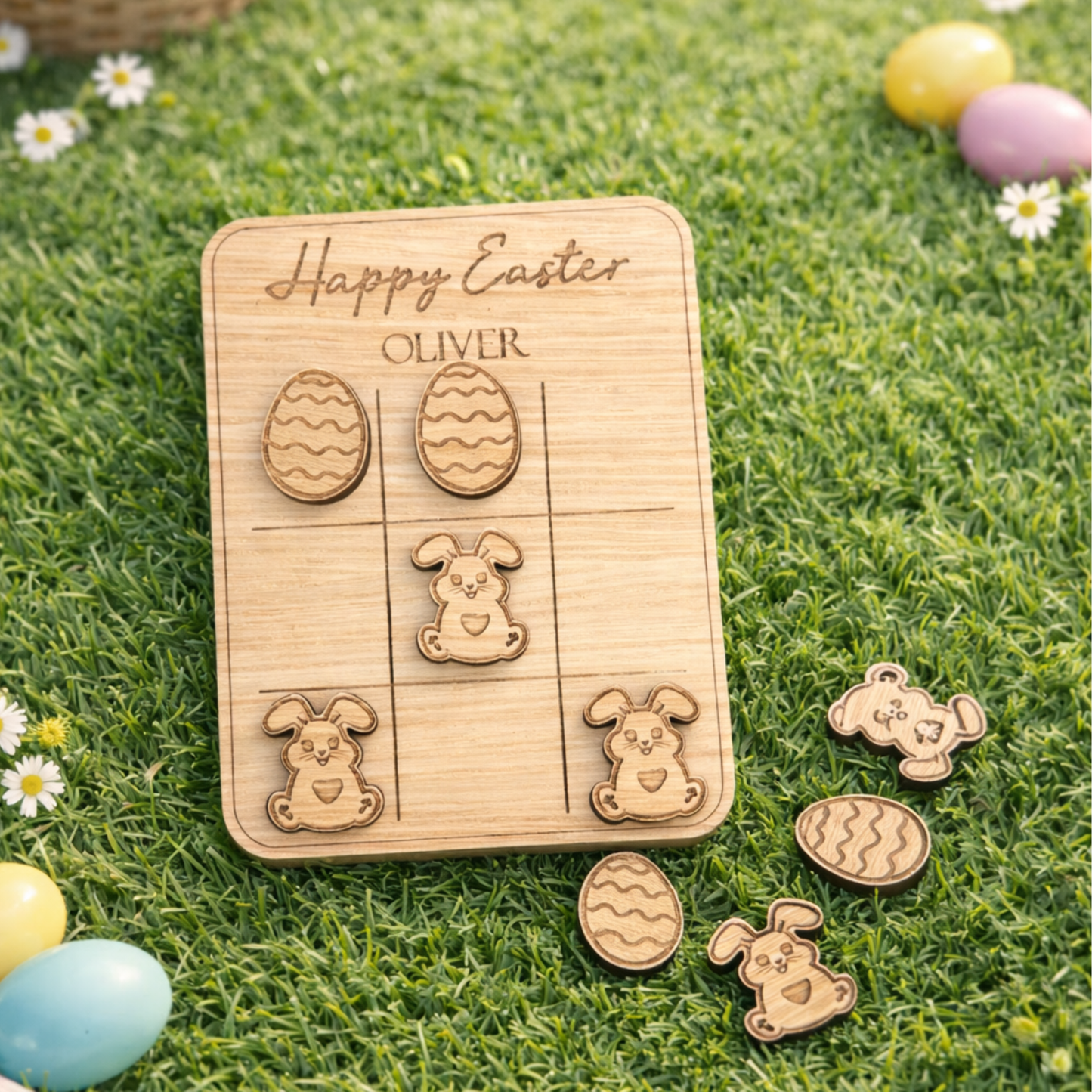 Wooden Easter puzzle with cut-out shapes on grass with Easter eggs