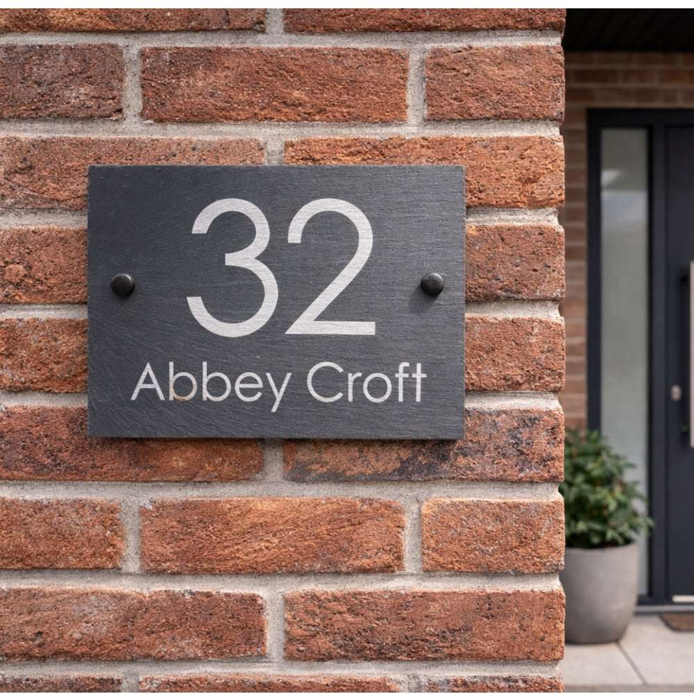 Personalised natural slate house sign engraved with house number and street name