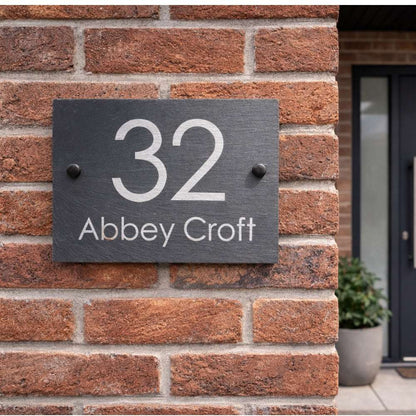 Personalised natural slate house sign engraved with house number and street name