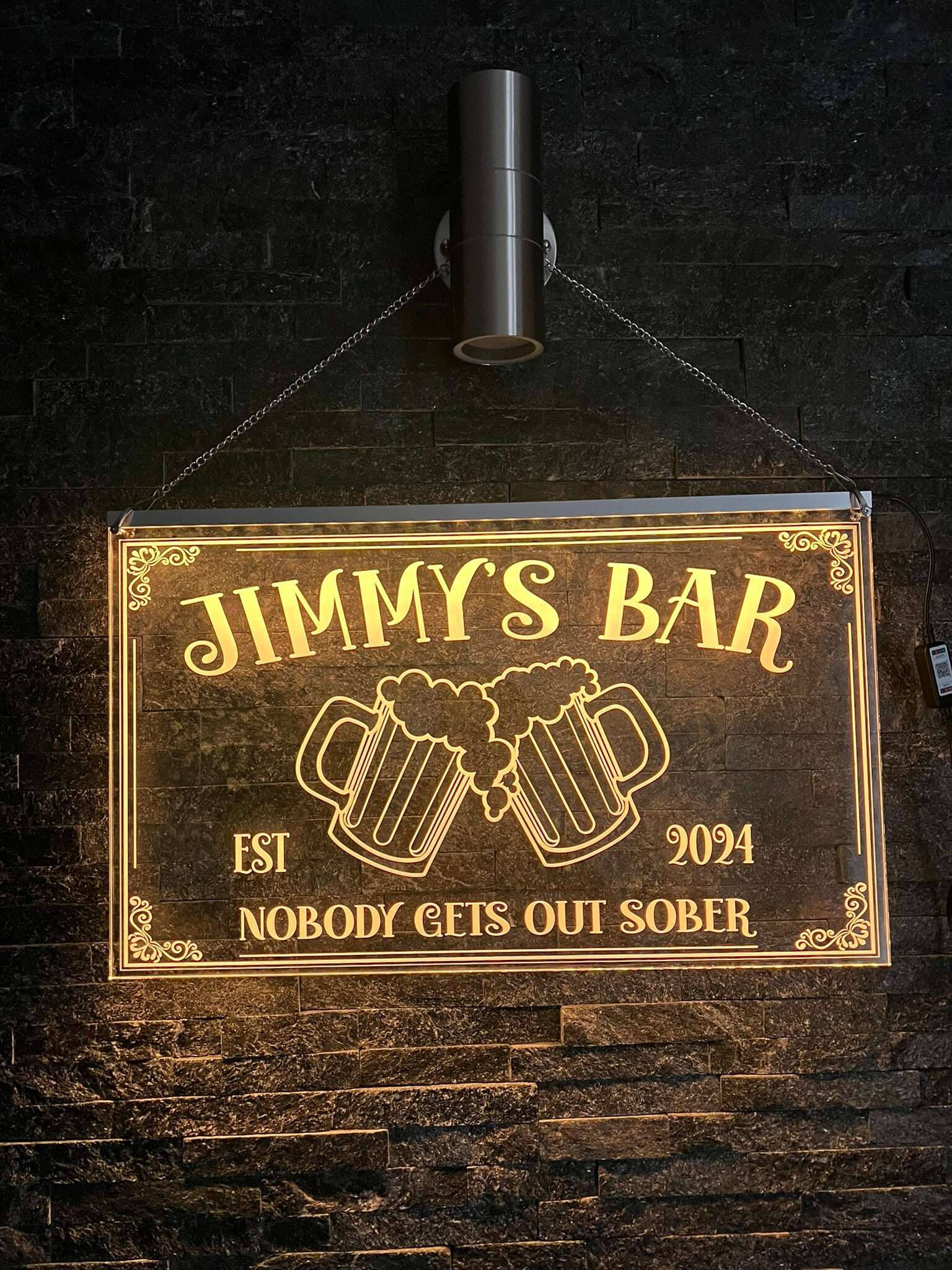 Colour-changing LED sign for modern home bar