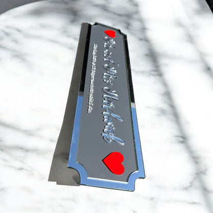 Custom acrylic wedding sign with Mr & Mrs and surname on countertop