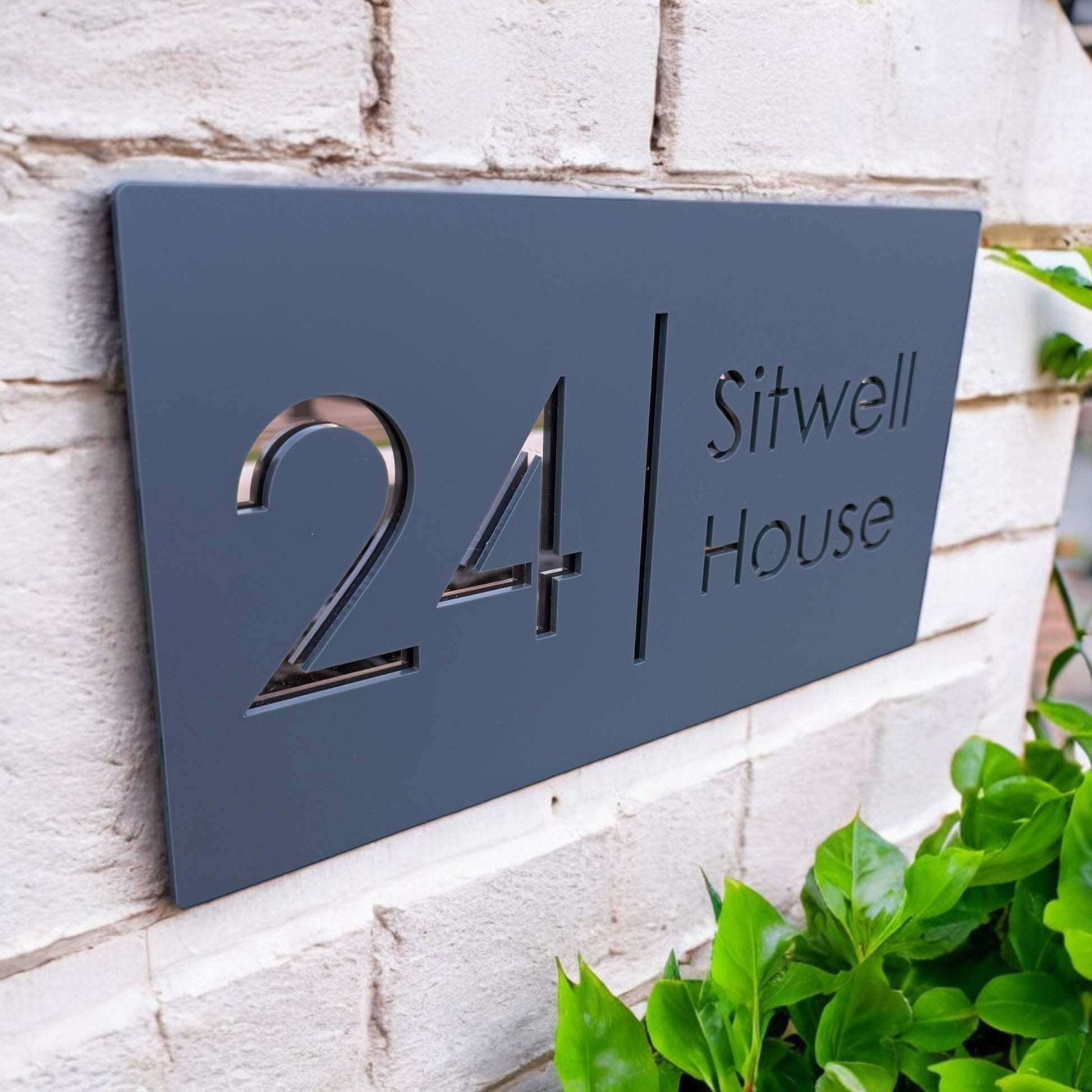 Floating house number and street name sign in rose gold and grey acrylic