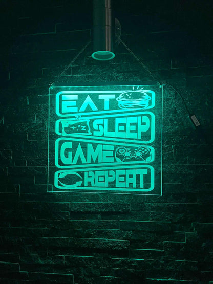 Custom LED sign featuring “Eat Sleep Game Repeat” phrase