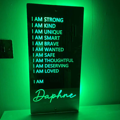 Glowing LED mirror sign with uplifting messages