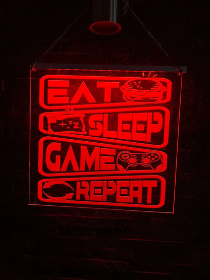 Illuminated “Eat Sleep Game Repeat” LED sign for gamers