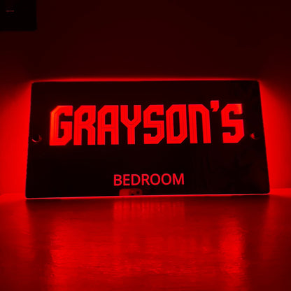 Softly lit LED mirror sign in a child’s bedroom at night, creating a cosy and magical atmosphere