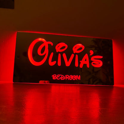 LED name sign with included remote control and USB cable for easy power and light control.
