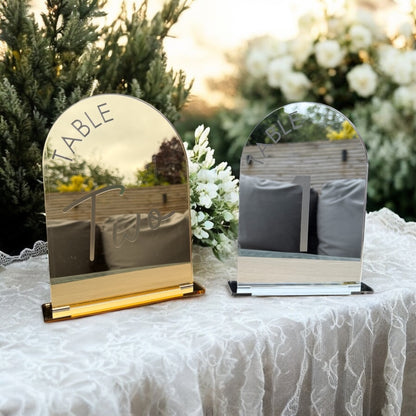 Gold mirror arch table number with modern font on event table