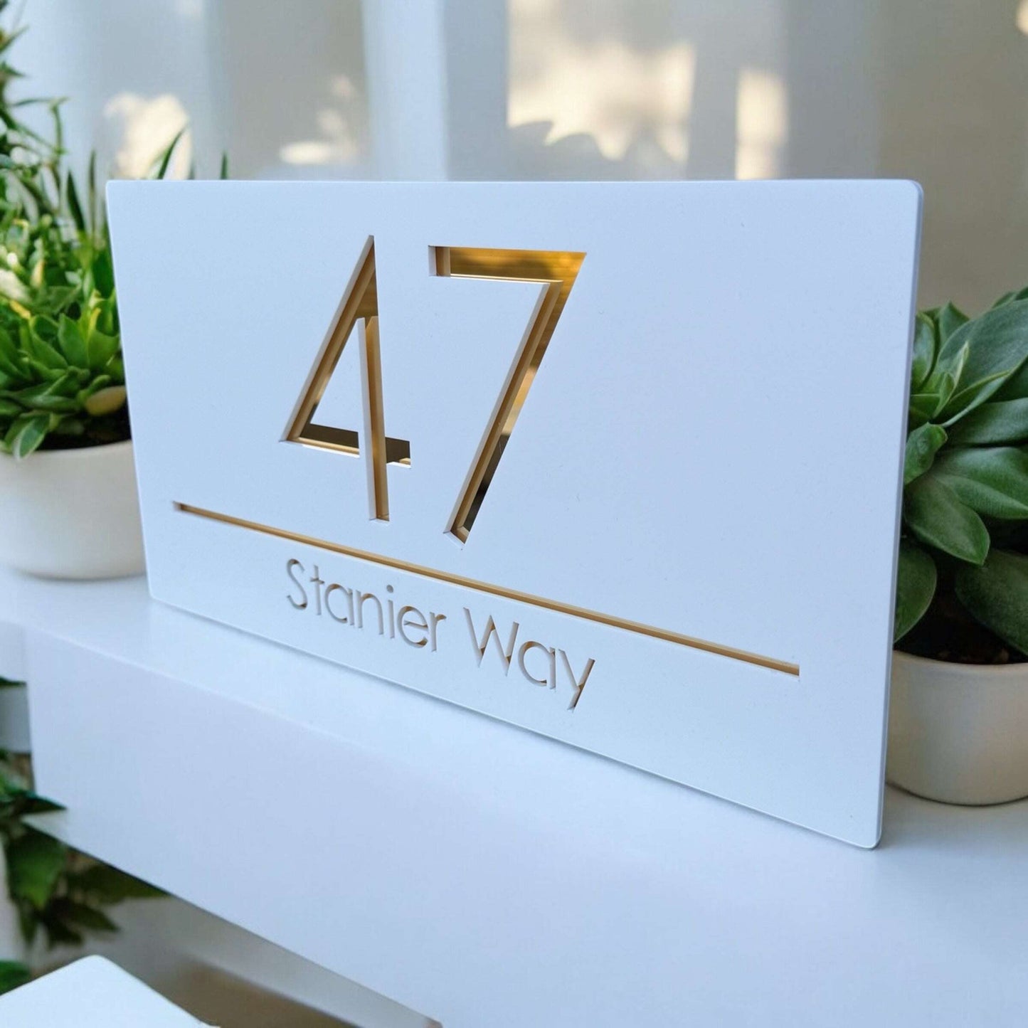 Elegant acrylic house number plaque with white and rose gold finish