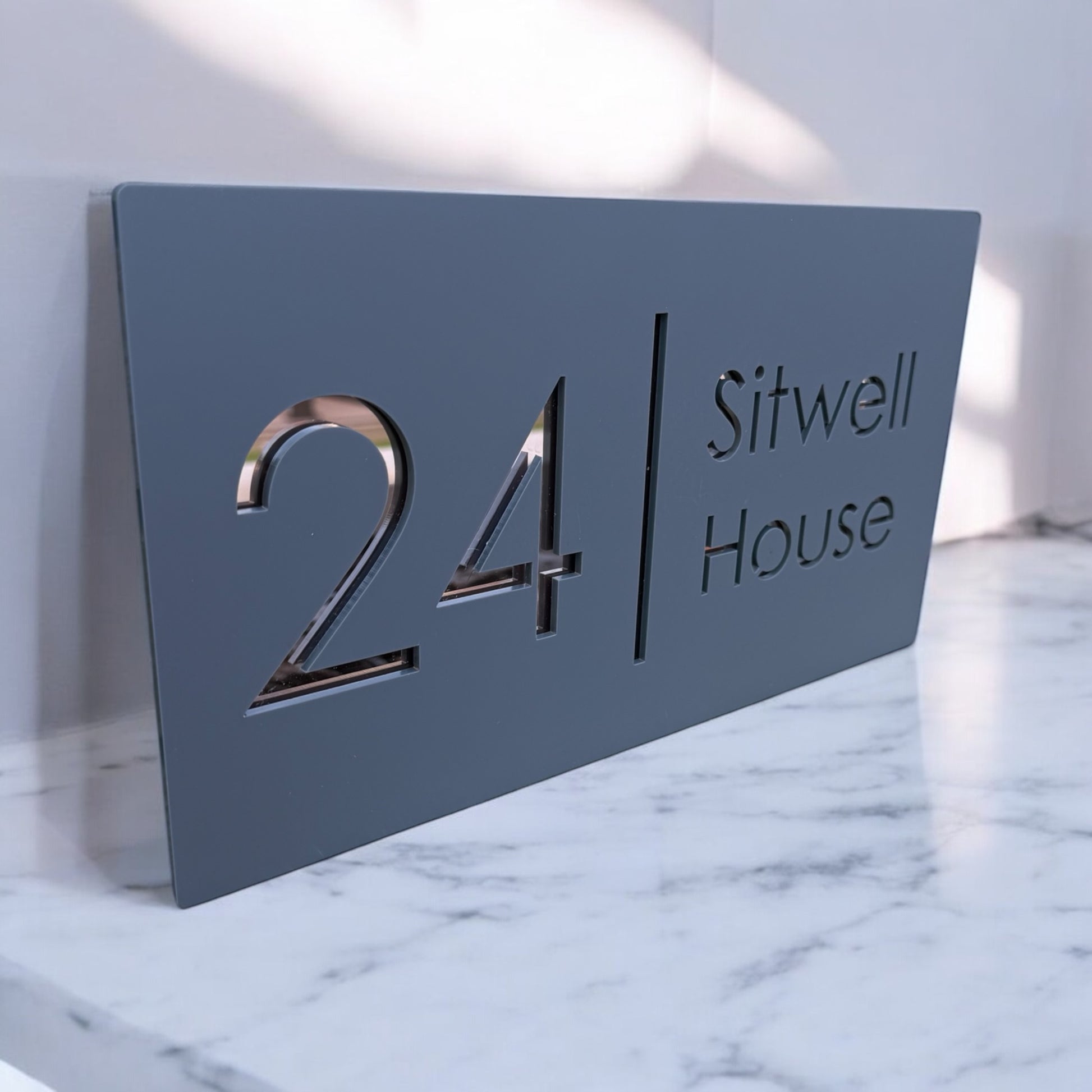 Stylish house number and street name plaque with layered acrylic design